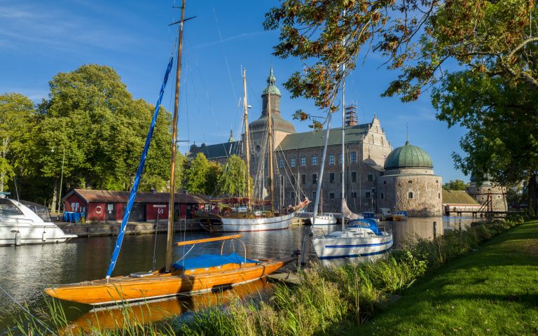 Blue skies, castle and sailing boats